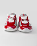 Sneakers Prada America’s Cup en cuir verni et tissu